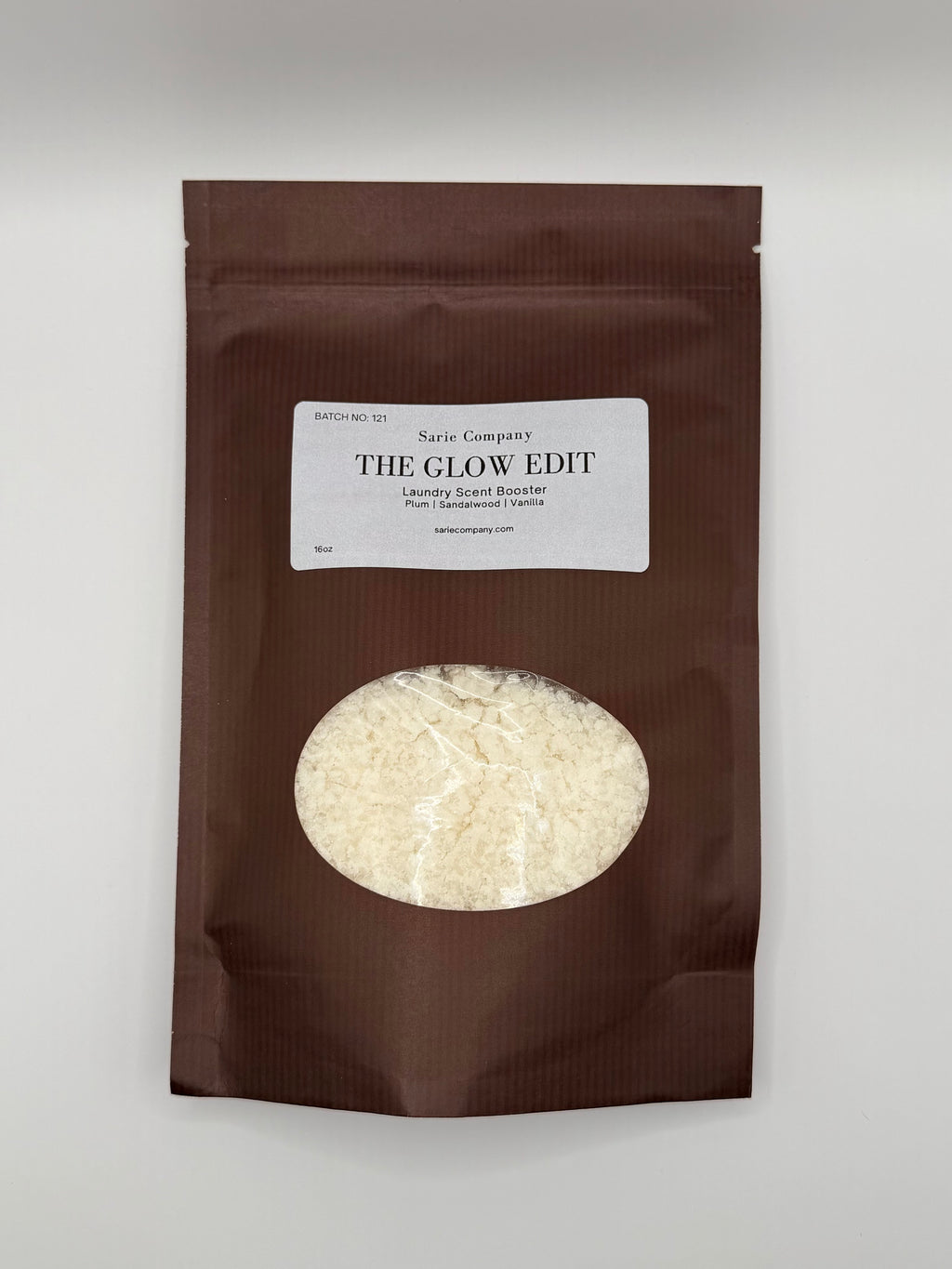 Sarie Company's Glow Edit booster in a brown package on a white background.