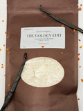 Sarie Company laundry scent booster package with vanilla beans and a vanilla pod on a white background